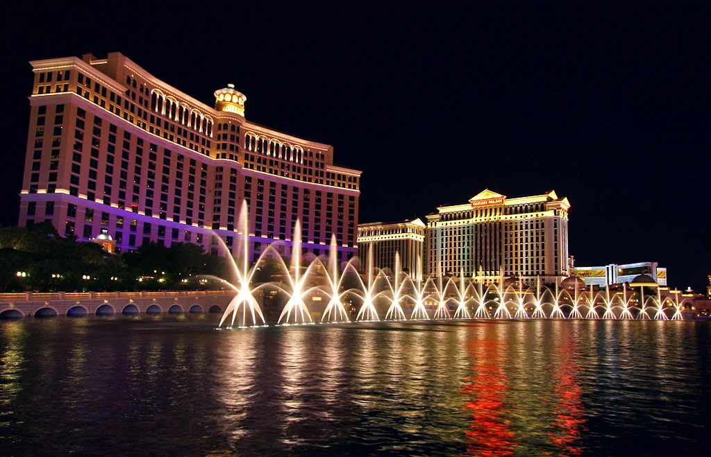 The Bellagio hotel and illuminated fountains at night in Las Vegas