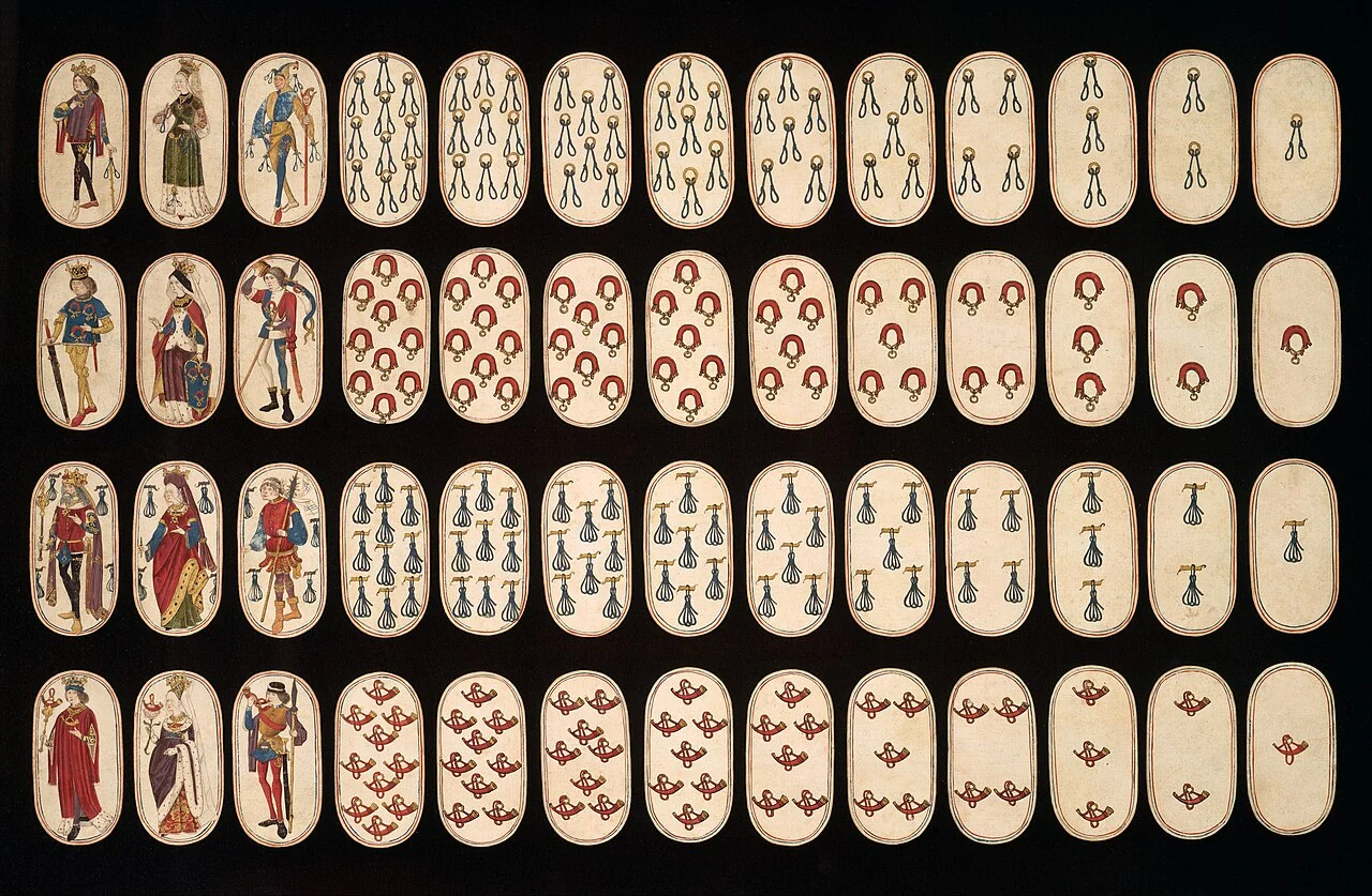 The fifteenth-century Cloisters playing-card deck arranged to show its painted hunting-themed cards